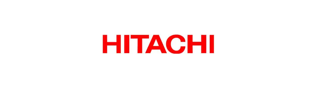 L'image affiche le logo Hitachi, avec le mot « HITACHI » en lettres majuscules rouges et grasses sur fond blanc.